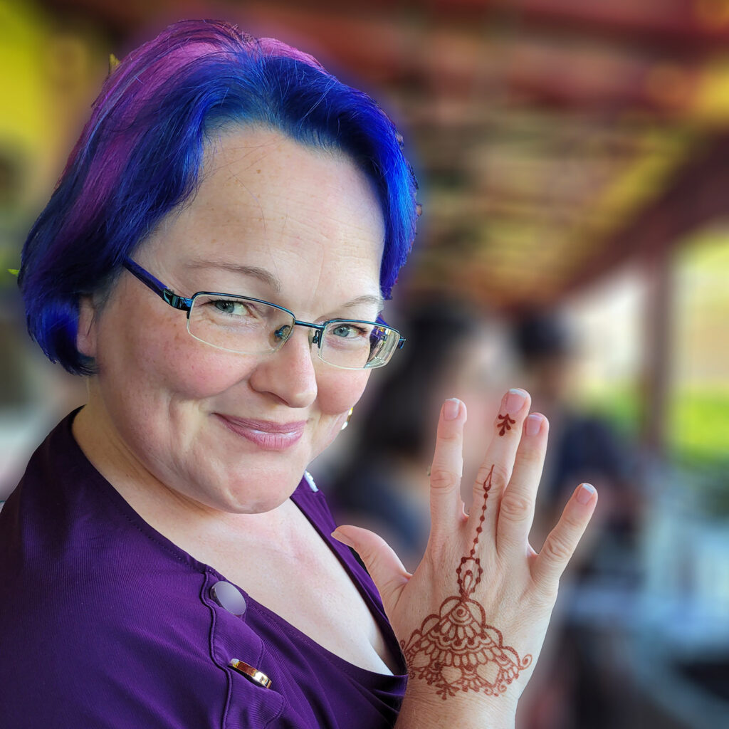Henna Experience artist, Mary, showing a beautiful henna stain.