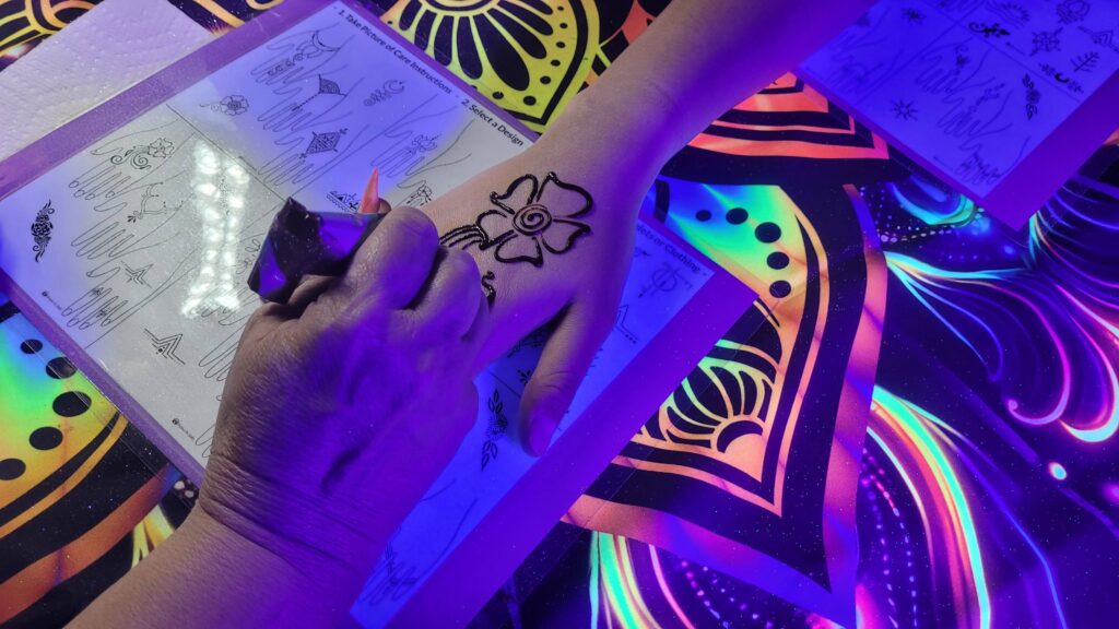 Henna under a UV light for glow events